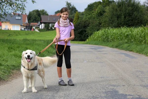 Little girl and her dog — Stock Photo, Image