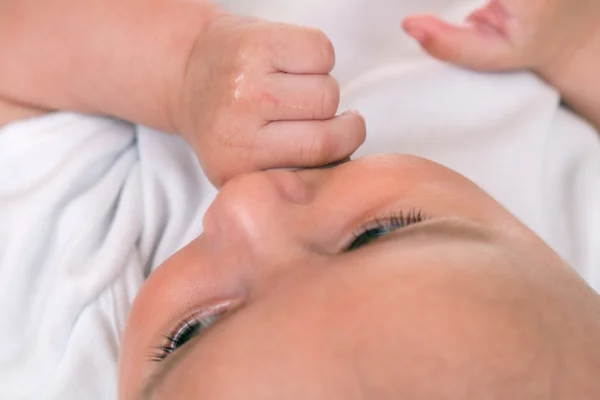 Baby sucking on his thumb — Stock Photo, Image