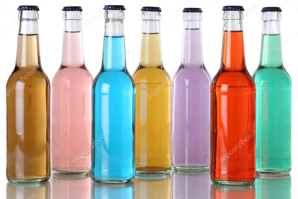 Colorful soda drinks with cola in bottles