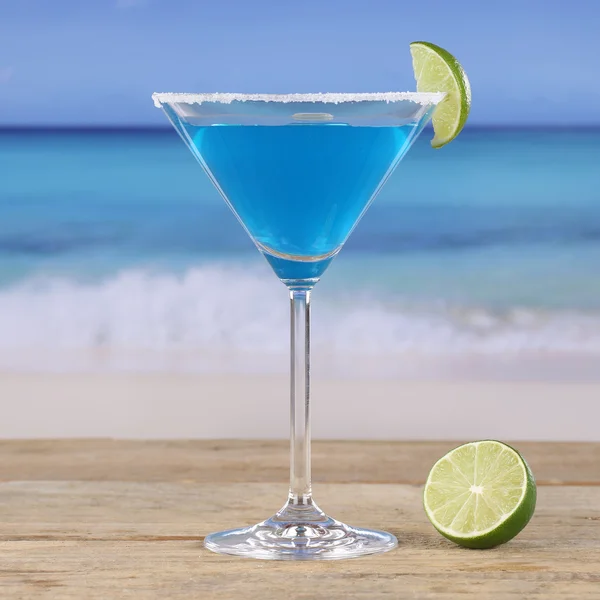 Blue Curacao cocktail drink on the beach — Stock Photo, Image