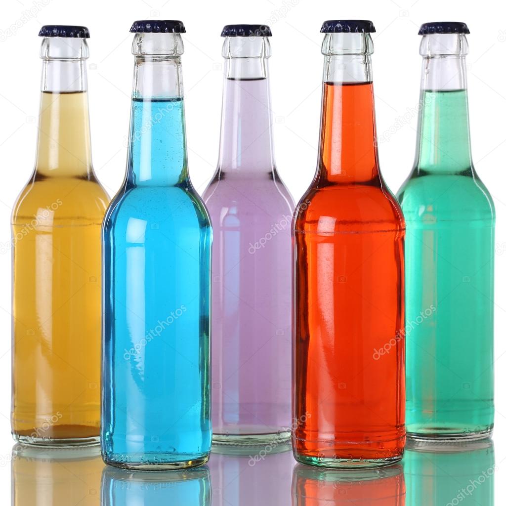 Colorful soda and soft drinks in bottles with reflection