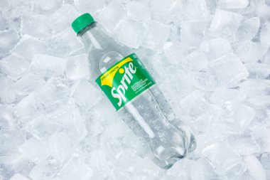 Stuttgart, Germany - August 31, 2021 Sprite lemonade soft drink in a plastic bottle on ice cubes in Stuttgart, Germany. clipart