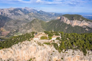 Ruins of castle Castell Alaro on Mallorca mountain landscape scenery travel traveling holidays vacation aerial photo view in Spain clipart