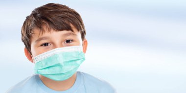 Çocuk çocuk, Coronavirus Corona Virüsü 'ne karşı maske takıyor. Corona Virüs COVID-19 Covid portresi.