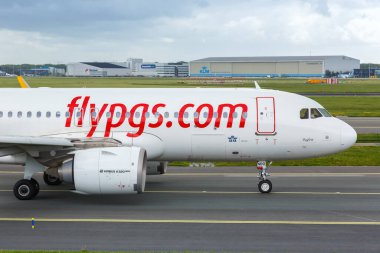 Amsterdam, Netherlands - May 21, 2021 Pegasus Airlines Airbus A320neo airplane at Amsterdam Schiphol airport (AMS) in the Netherlands. clipart
