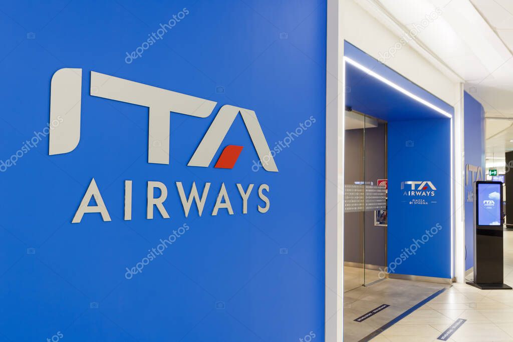 Rome, Italy - March 19, 2022 ITA Airways logo at a lounge at Rome Fiumicino Airport (FCO) in Italy.