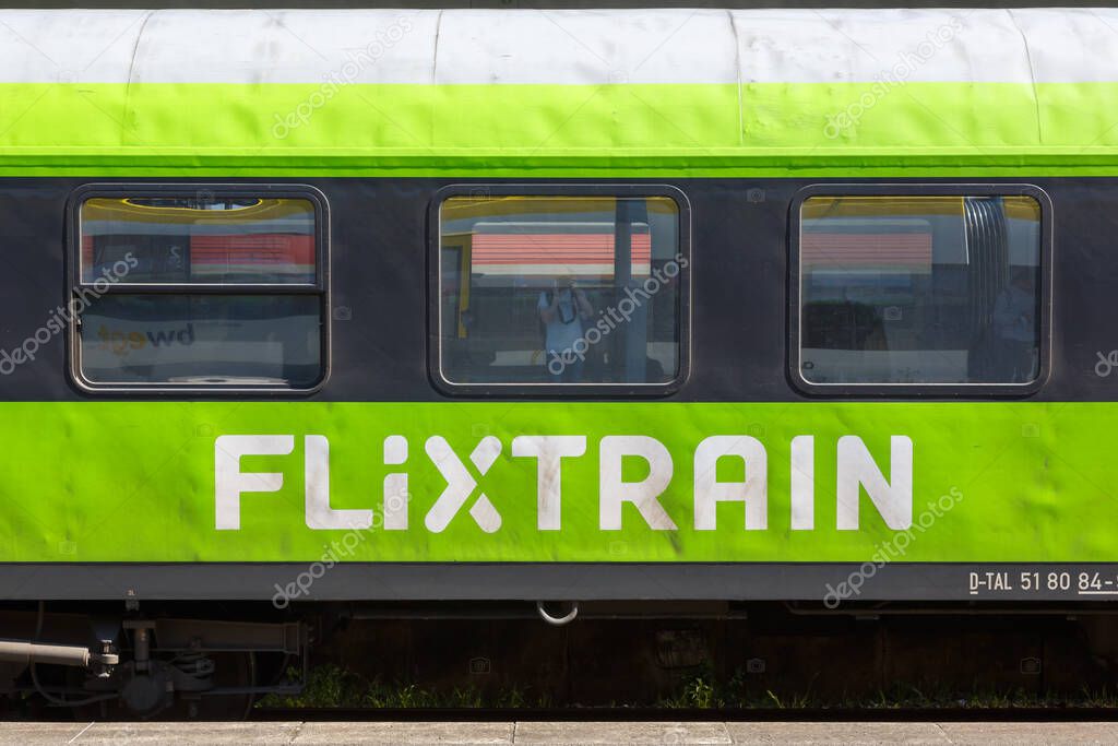 Stuttgart, Germany - April 28, 2022: Flixtrain logo on a train at main railway station in Stuttgart, Germany.