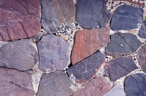 Architektonische Hintergrund der Mauer aus Stein gebaut. — Stockfoto