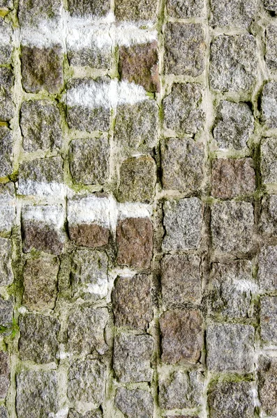 Achtergrond van oude decoratieve stenen muur. — Stockfoto