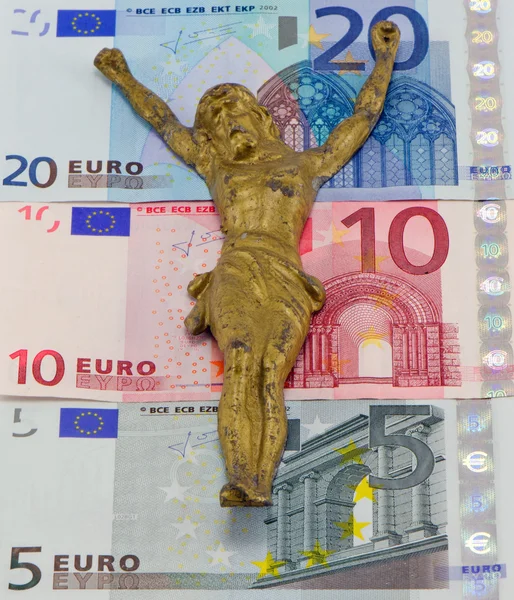 Concept gold jesus crucify on euro banknotes — Stock Photo, Image