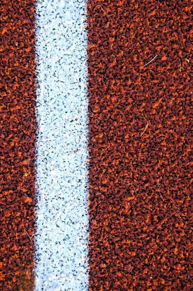 Stadium running track surface closeup textures — Stock Photo, Image