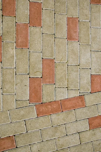 City sidewalk lined with small tile background — Stock Photo, Image