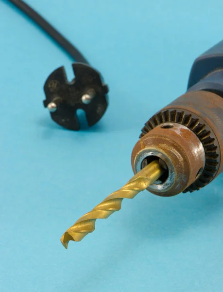 Rusty old electric drill golden bit closeup — Stock Photo, Image