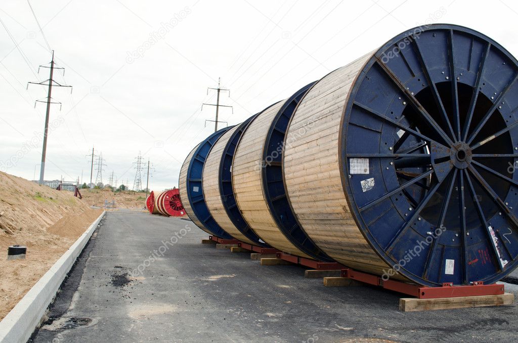 High voltage cable reels and road construction — Stock Photo © sauletas  #15561133