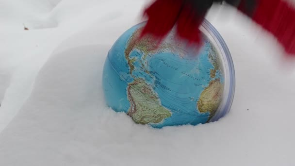 Hand earth globe snow — Stock Video