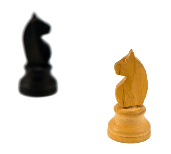 White chess knight figure blurr black horse white — Stock Photo, Image