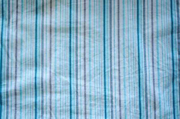 Arruga tela azul líneas grises fondo blanco — Foto de Stock