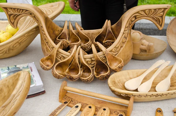 Wooden ornate spoons set bowl of composition fairs — Stock Photo, Image