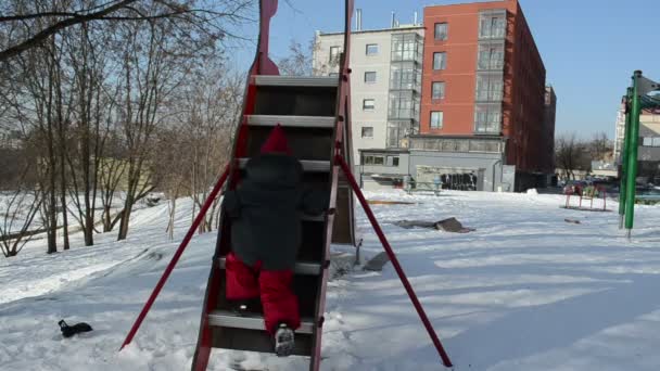 Little stumble on stairs in hurry slide down the first — Stock Video