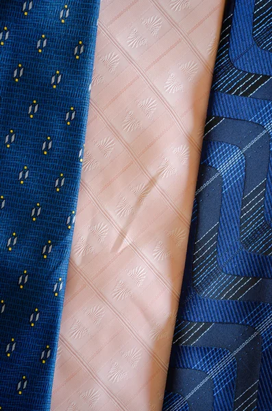 Cravat tie scarfs texture blue pink background — Stock Photo, Image