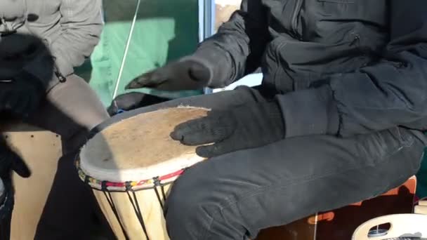 Musician young play wooden handmade drum outdoor spring concert — Stock Video