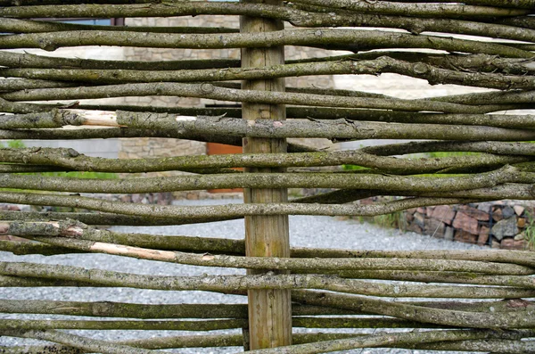 Primer plano mimbre tejer madera ramita cerca fondo — Foto de Stock
