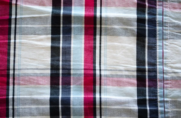 Fabric material square red blue black background — Stock Photo, Image