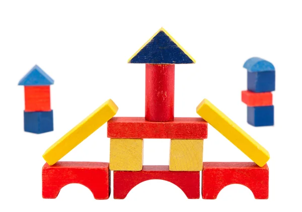 Colorful wood toy brick construction on white — Stock Photo, Image