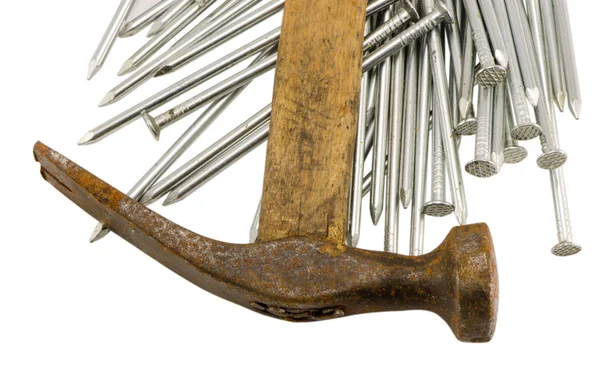 Curvy vintage rusty hammer nails pile isolated — Stock Photo, Image