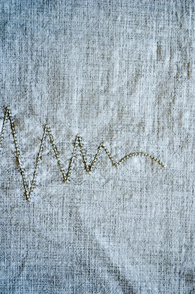 Linen background embroider ornament closeup — Stock Photo, Image