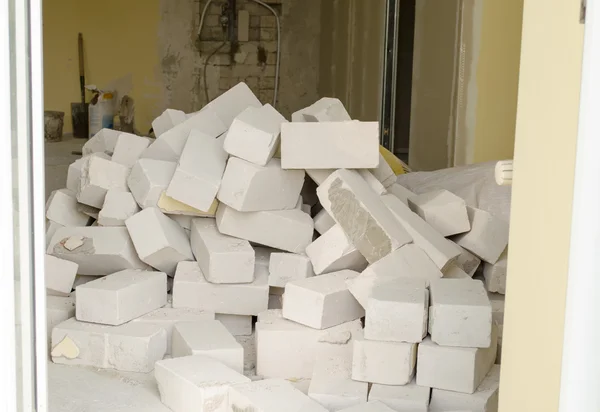 Big stack of white building bricks — Stock Photo, Image