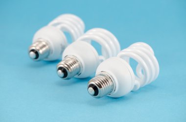 three novel economic fluorescent light bulb clipart