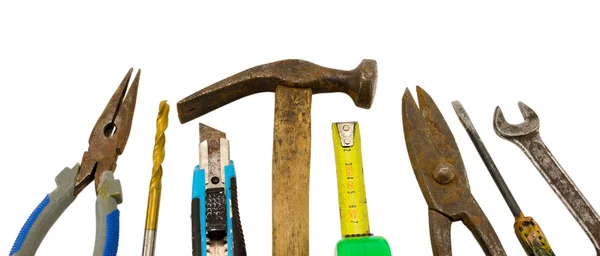 Diversi strumenti di lavoro di costruzione retrò su bianco — Foto Stock