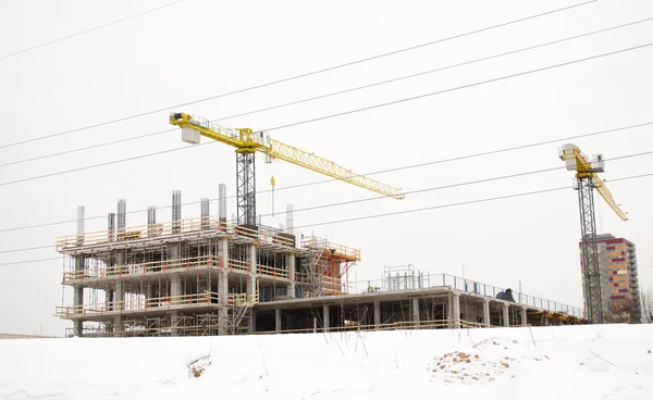Building construction industry cranes winter snow — Stock Photo, Image