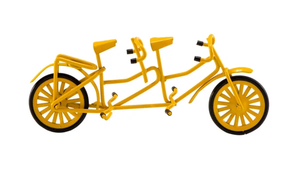 Dubbel bicicle modell leksak inredning isolerad på vit Royaltyfria Stockfoton