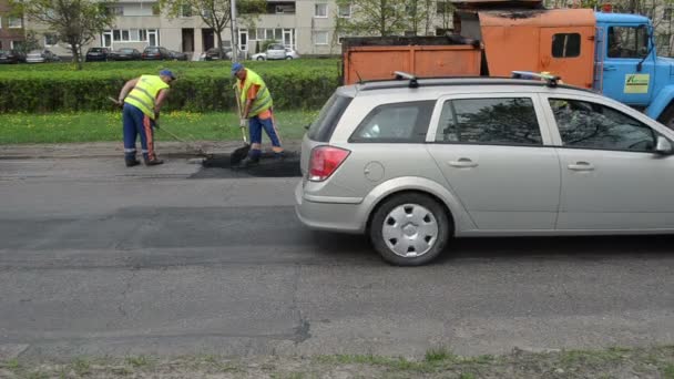 Trabajo callejero asfalto carretera — Vídeo de stock