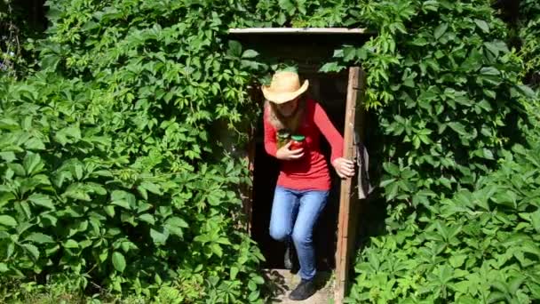 Woman cellar canned jar — Stock Video