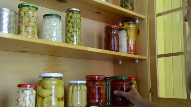 Wooden cupboard jars — Stock Video