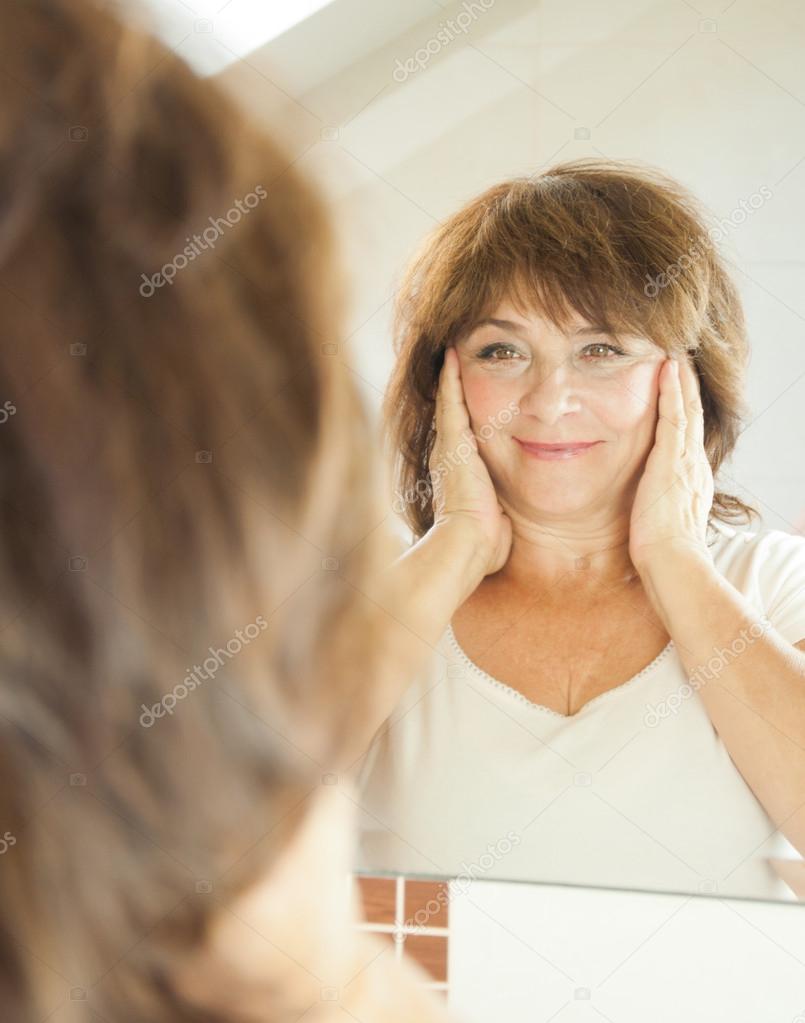 Elderly woman in the bathroom.