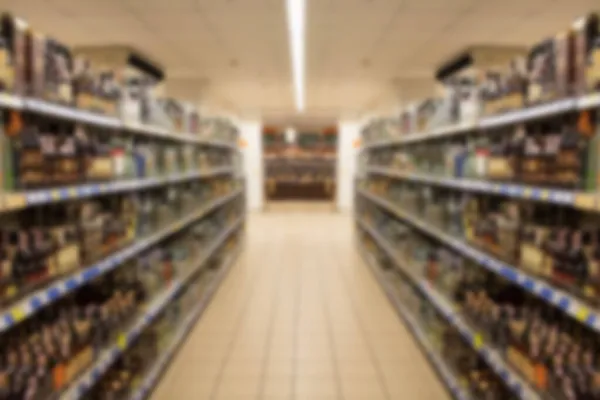 Blur abstract background of people shopping in super market ,products on shelves ,Supermarket with bokeh,customer defocus ,vintage color. — Stock Photo, Image