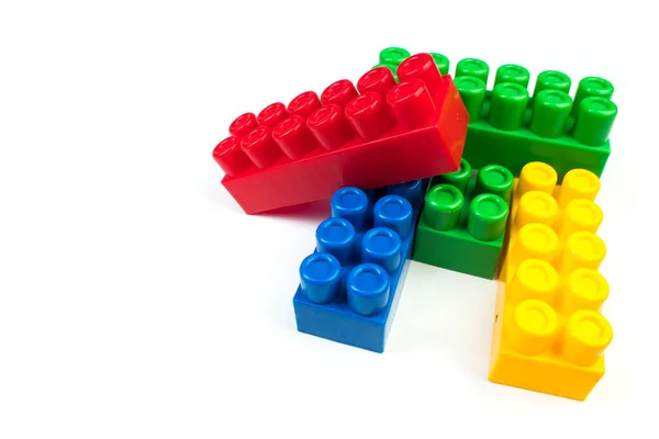 Lot of colorful rainbow toy bricks background. Educational toy, constructor for children Isolated on white background. 3D Rendering. Top view with copy space
