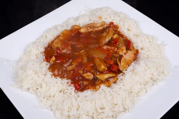 Sweet and sour chicken with rice. — Stock Photo, Image