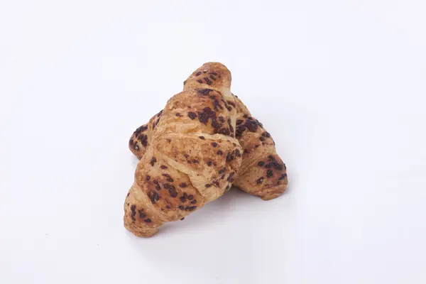 Čerstvý croissant čokoládový na bílém pozadí — Stock fotografie