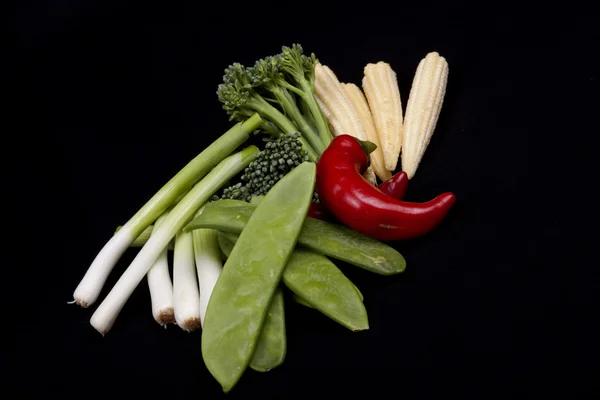 Spaanse peper, broccoli, baby prei, baby maïs en schurft tout — Stockfoto