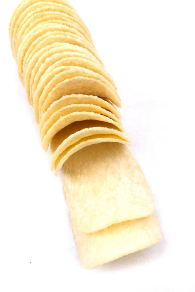 Patatas fritas (chips) sobre fondo blanco — Foto de Stock