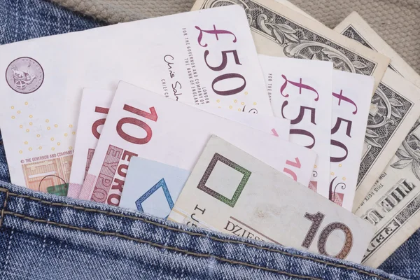 Geld in der Tasche — Stockfoto