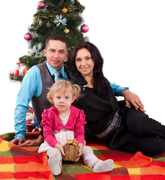 Happy family having fun with Christmas presents — Stock Photo, Image