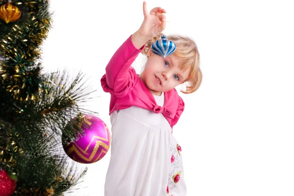 Glada leende liten flicka med gåvor — Stockfoto