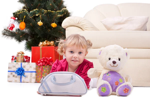 Happy smiling little girl with gifts — Stock Photo, Image