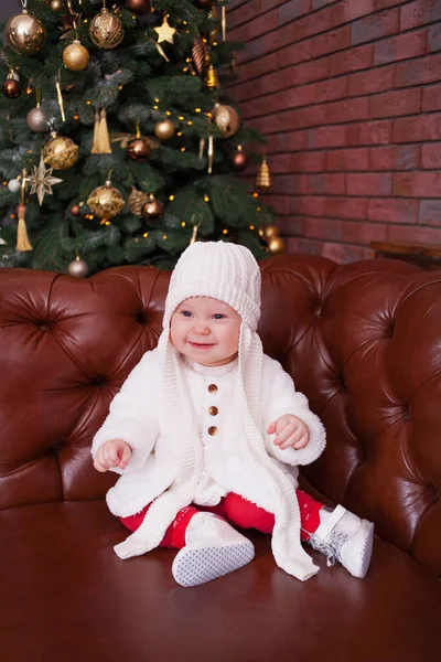 Happy baby smile near the Christmas tree — Stock Photo, Image